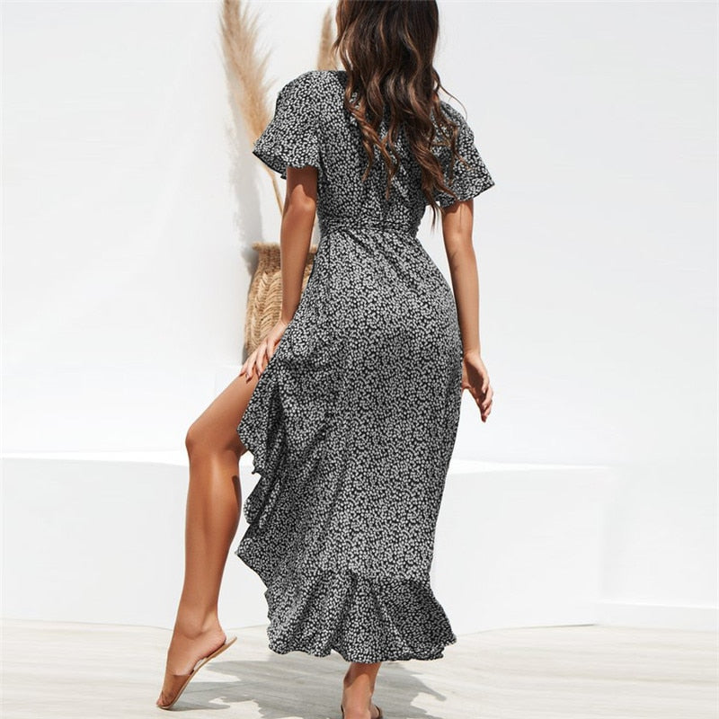 Floral print boho summer beach maxi dress with ruffles, V-neck, split design, casual wrap style from The Clothing Company Sydney.
