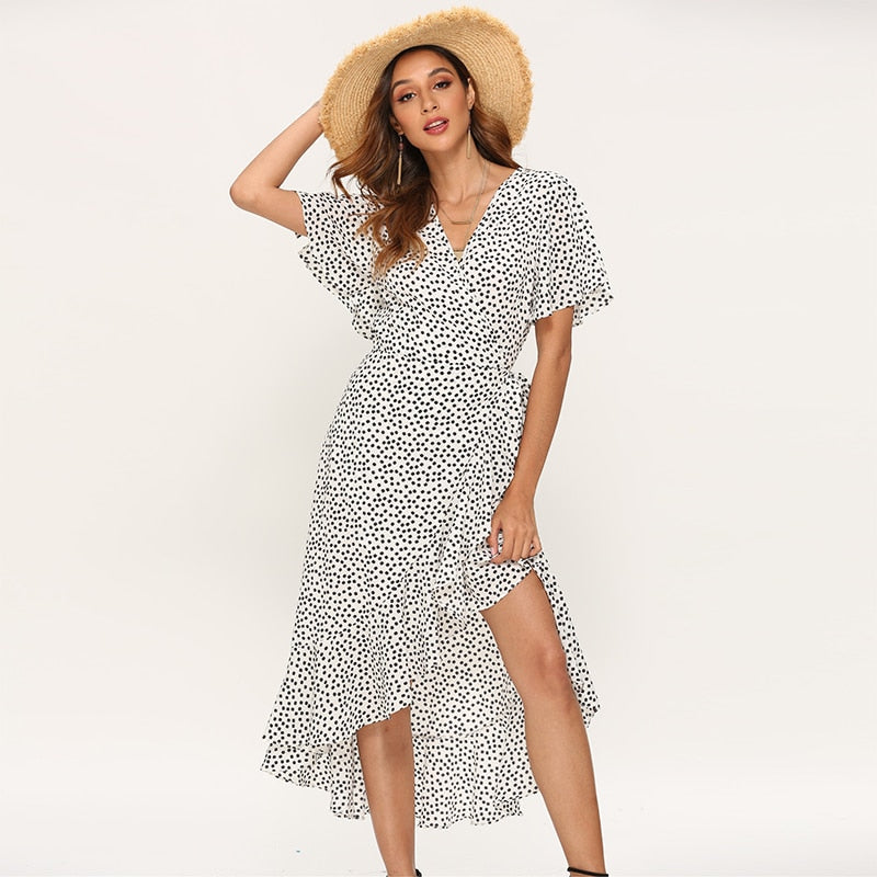 Floral print boho summer beach maxi dress with ruffles, V-neck, split, and wrap design by The Clothing Company Sydney.