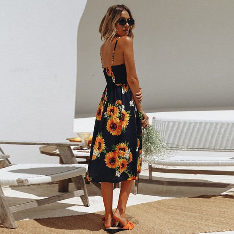 Vintage boho sundress with polka dots, stripes, floral patterns, midi length, backless design, from The Clothing Company Sydney.