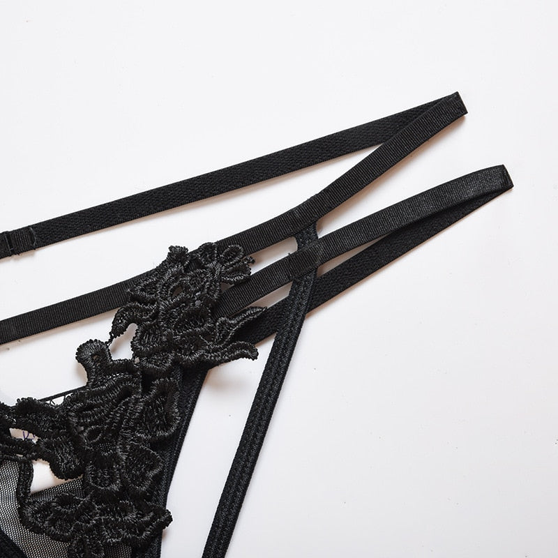 Black 2-piece transparent lingerie set by The Clothing Company Sydney, includes hollow-out bra and G-string briefs.