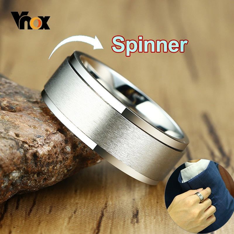 Stainless steel spinner ring for men and women featuring 6/8mm bands, stress relief design, casual jewelry accessory.