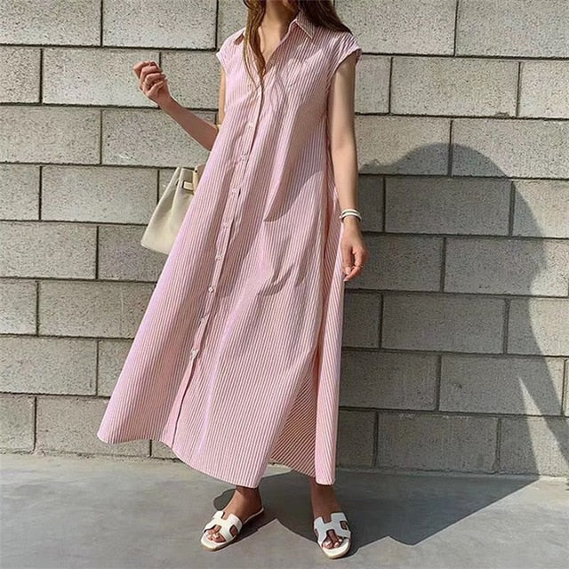 Striped sleeveless spring summer dress by The Clothing Company Sydney featuring an oversized casual fit and lace-up detail.
