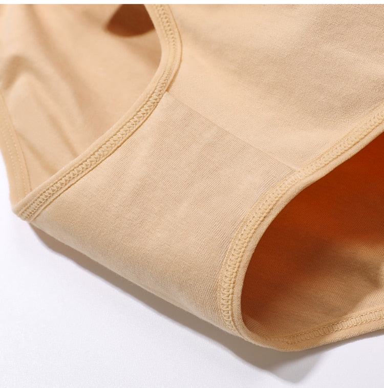 Six-pack women's cotton mix low-rise briefs in solid colors, breathable and seamless for comfortable everyday underwear.