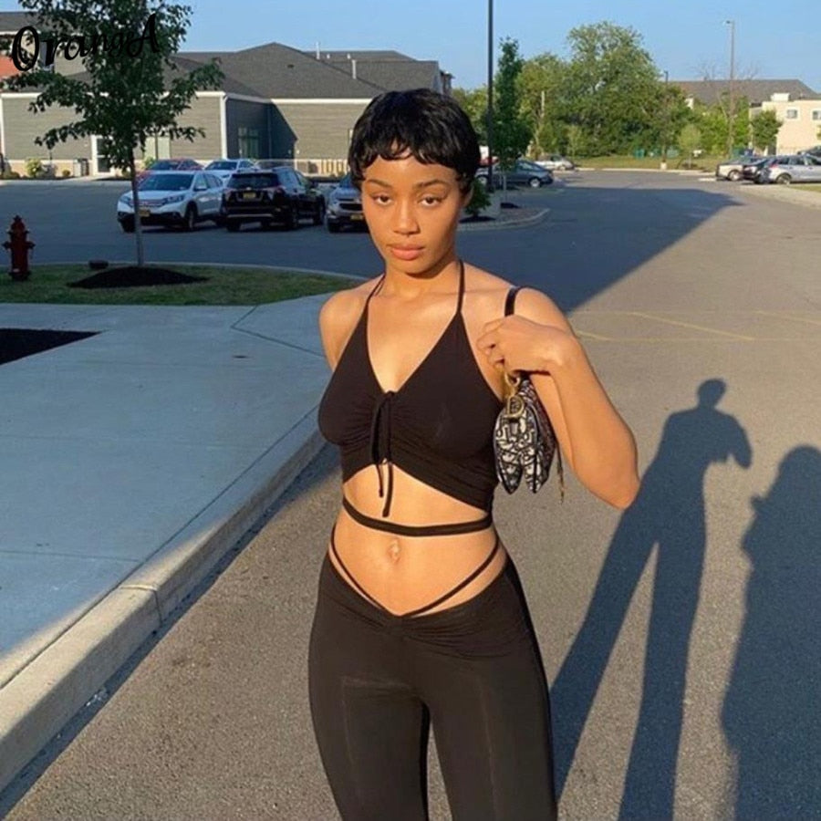 Stretchy black sweatpants from The Clothing Company Sydney, part of a 2-piece halter bandage v-neck sleeveless clubwear set.