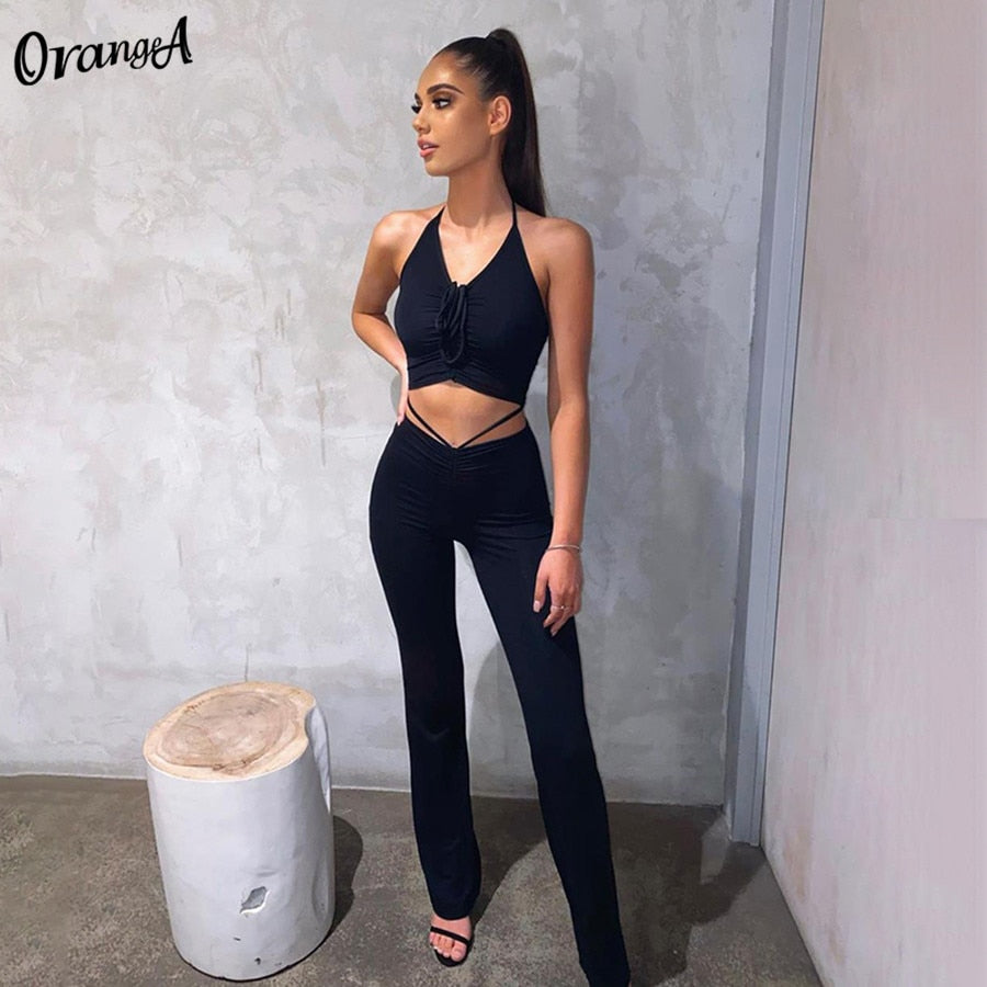 Stretchy black bodycon pants from The Clothing Company Sydney, featuring a fitted, high-waist design with a sleek, seamless look.