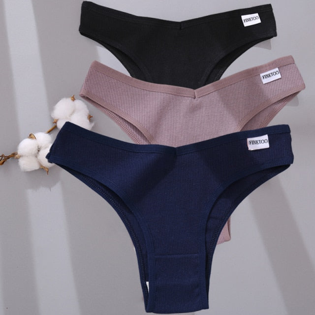 Three-pack cotton mix lingerie thongs by The Clothing Company Sydney, low-rise women's bikini briefs with colorful designs.