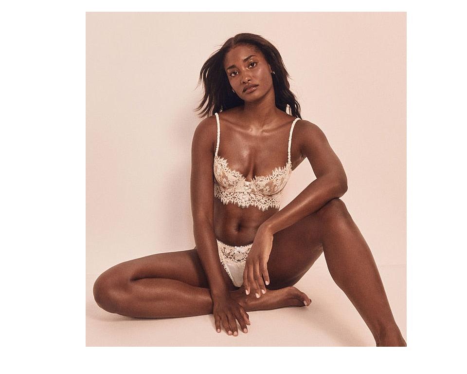 Sexy low-waist lace thong underwear with embroidery, transparent hollow-out design, T-back style from The Clothing Company Sydney.