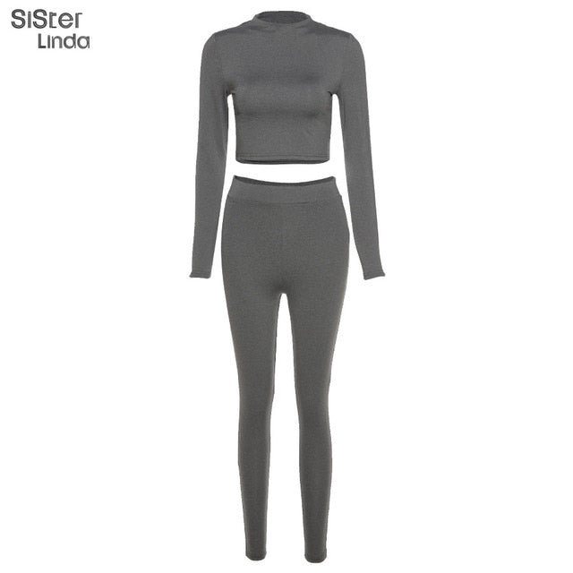 Two-piece sporty activewear set with long sleeve tops and leggings from The Clothing Company Sydney, perfect for fall workouts.
