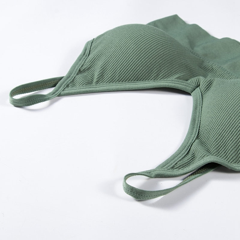 Black seamless crop top bra from The Clothing Company Sydney, backless, padded, and ideal as lingerie or sportswear.