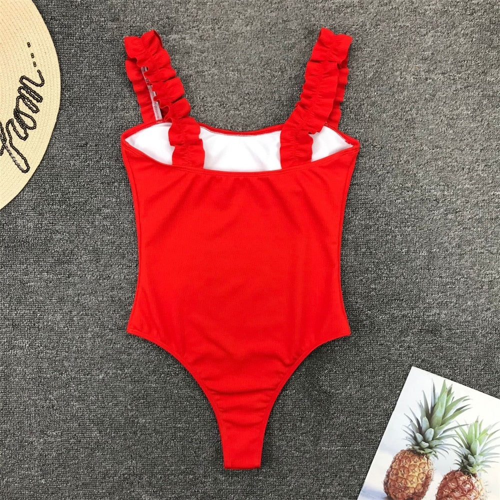 Vintage one-piece ruffled push-up swimwear by The Clothing Company Sydney, featuring solid color, padded monokini design.