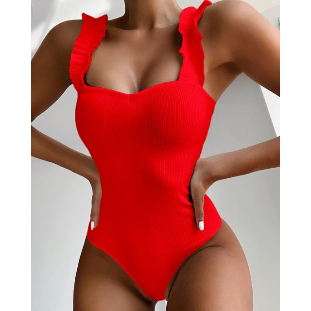 Vintage one-piece ruffled push-up swimwear by The Clothing Company Sydney featuring solid color, padded monokini bathing suit.