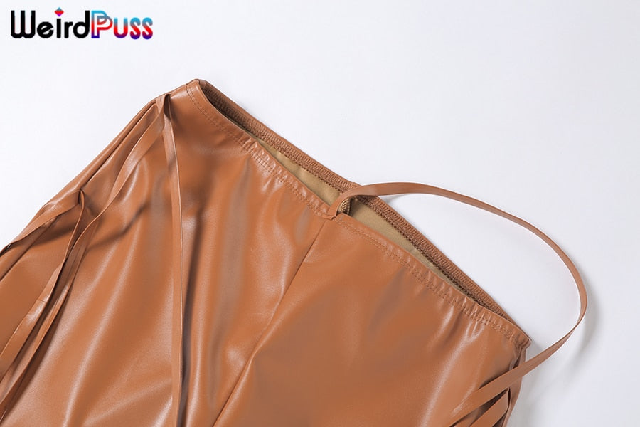 Faux leather high waist skinny sling pants with asymmetric design, solid color, and chic tight fit, perfect for fall fashion.