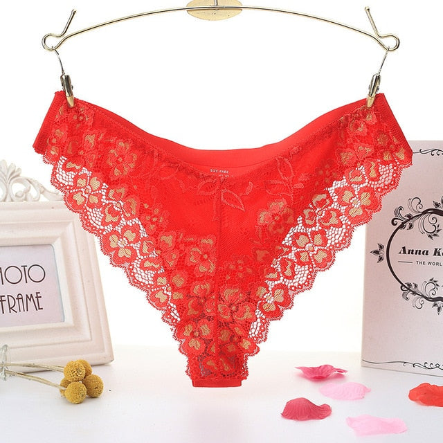 Low-waist lace thong with floral embroidery, transparent T-back design, and elegant lingerie style from The Clothing Company Sydney.