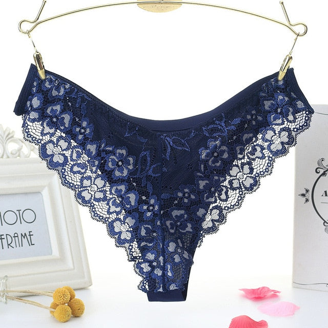 Low-waist lace thong from The Clothing Company Sydney featuring floral embroidery and transparent T-back design.