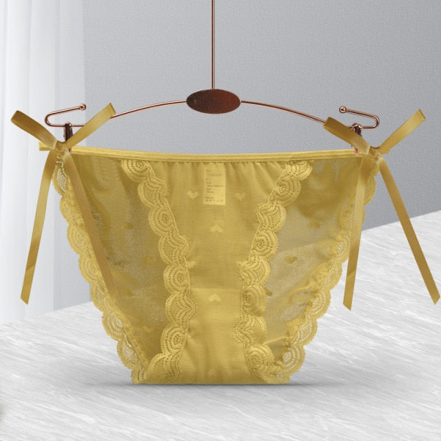 Sensual lace thong underwear by The Clothing Company Sydney featuring low-waist, translucent G-string design and bandage briefs.