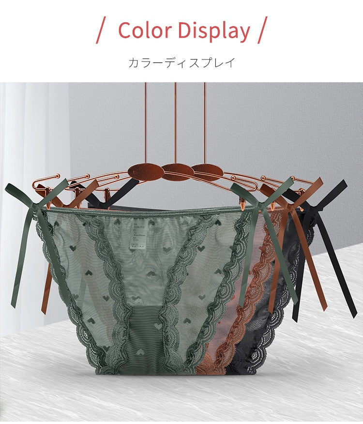 Sensual lace thong underwear by The Clothing Company Sydney featuring low-waist, translucent G-string design and bandage style.