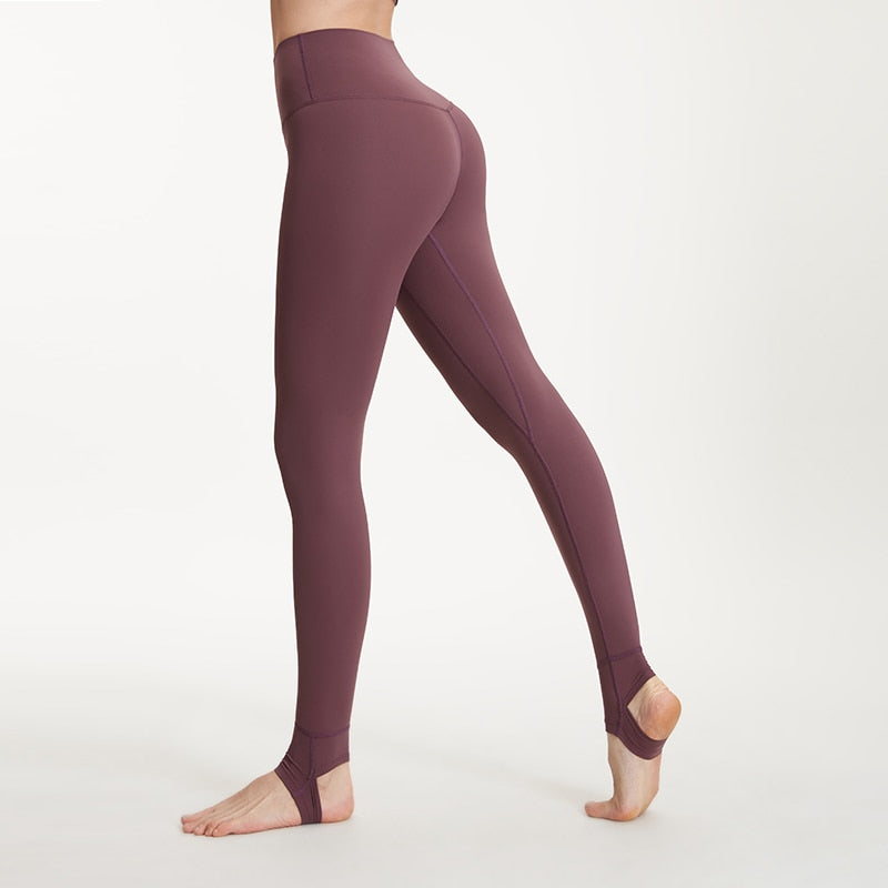 Women's high waist fitness yoga pants with stirrup design, tummy control, suitable for running and gym workouts by The Clothing Company Sydney