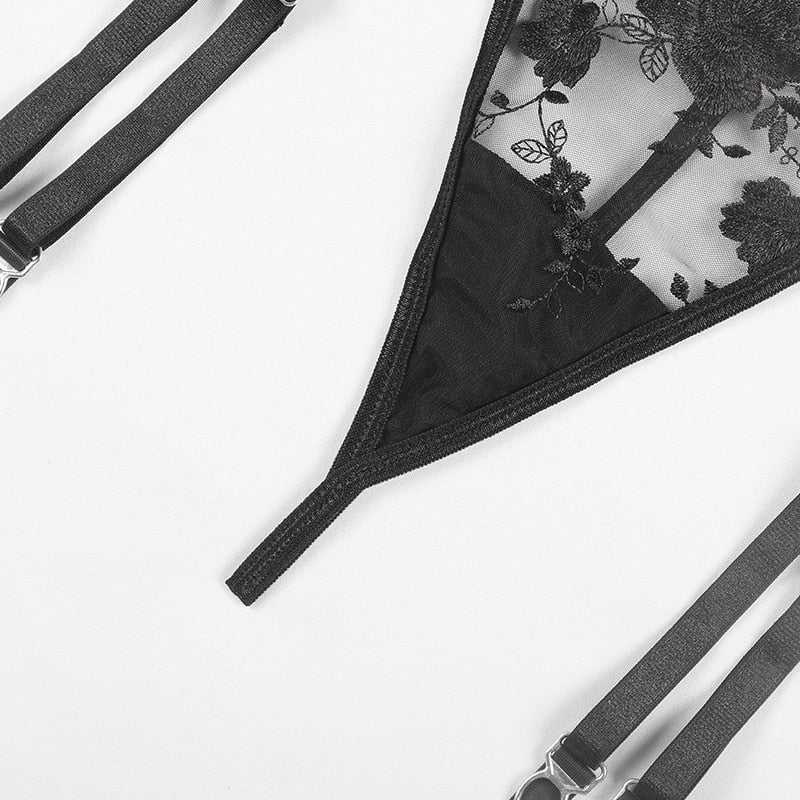Transparent lace push-up bra set with matching garters and thong, featuring embroidery details from The Clothing Company Sydney.
