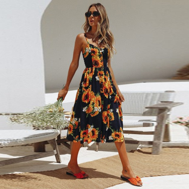 Vintage casual sundress by The Clothing Company Sydney featuring polka dots, stripes, floral print, midi length, backless, and button details.