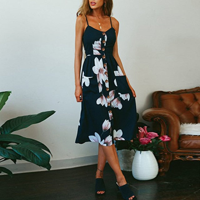 Vintage boho sundress from The Clothing Company Sydney featuring polka dots, stripes, floral patterns, midi length, backless design