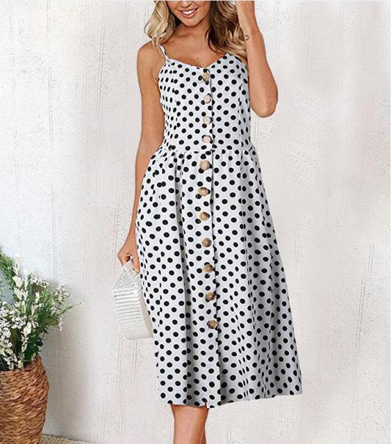 Vintage casual sundress by The Clothing Company Sydney featuring polka dots, stripes, floral patterns, and a backless, midi boho design.