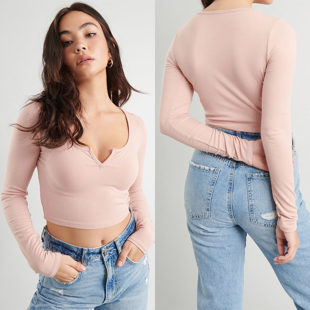 White V-neck long sleeve knitted crop top from The Clothing Company Sydney, slim fit, ribbed casual design.