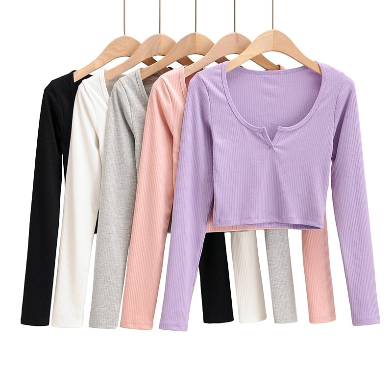 White V-neck long sleeve knitted crop top from The Clothing Company Sydney, featuring slim fit and ribbed knit texture.