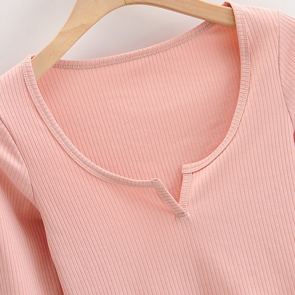 White V-neck long sleeve knitted crop top from The Clothing Company Sydney, slim fit with ribbed texture and casual style.