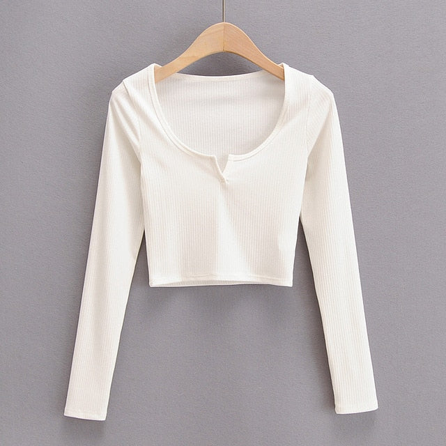 White V-neck long sleeve knitted crop top from The Clothing Company Sydney, featuring slim fit and ribbed texture.