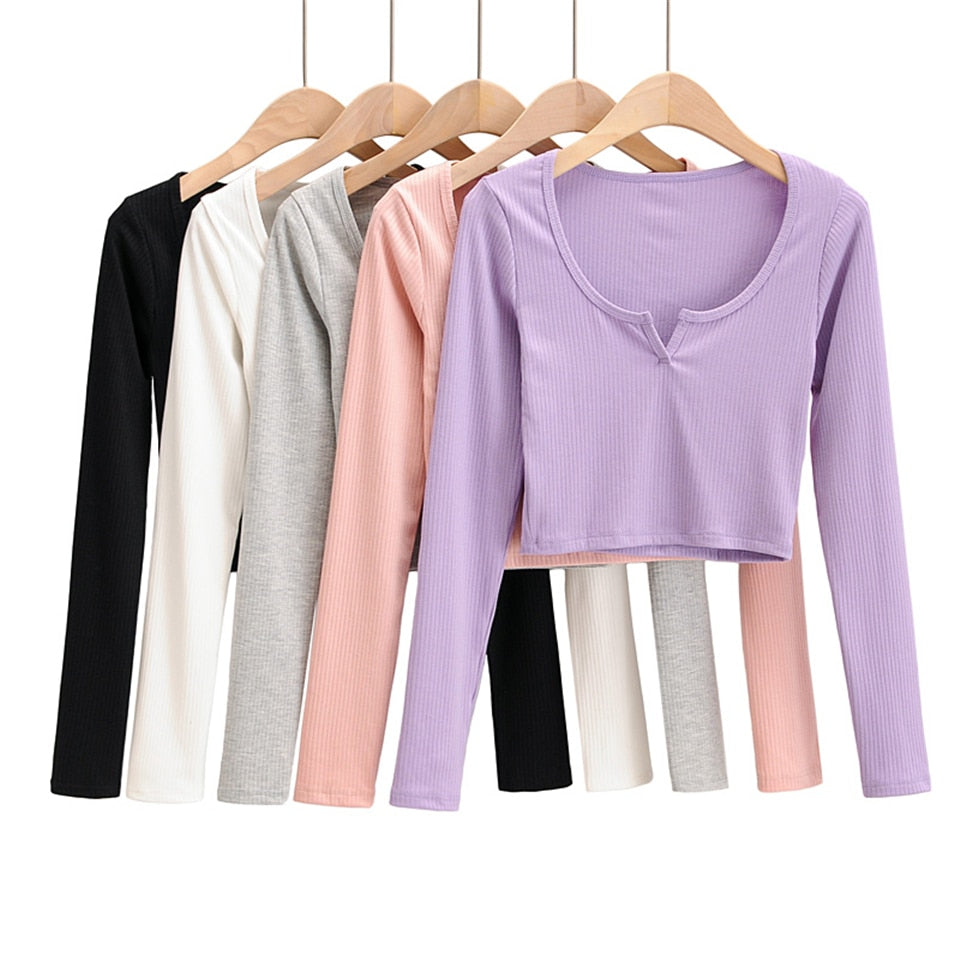 White V-neck long sleeve knitted crop top from The Clothing Company Sydney, featuring slim fit and ribbed texture.