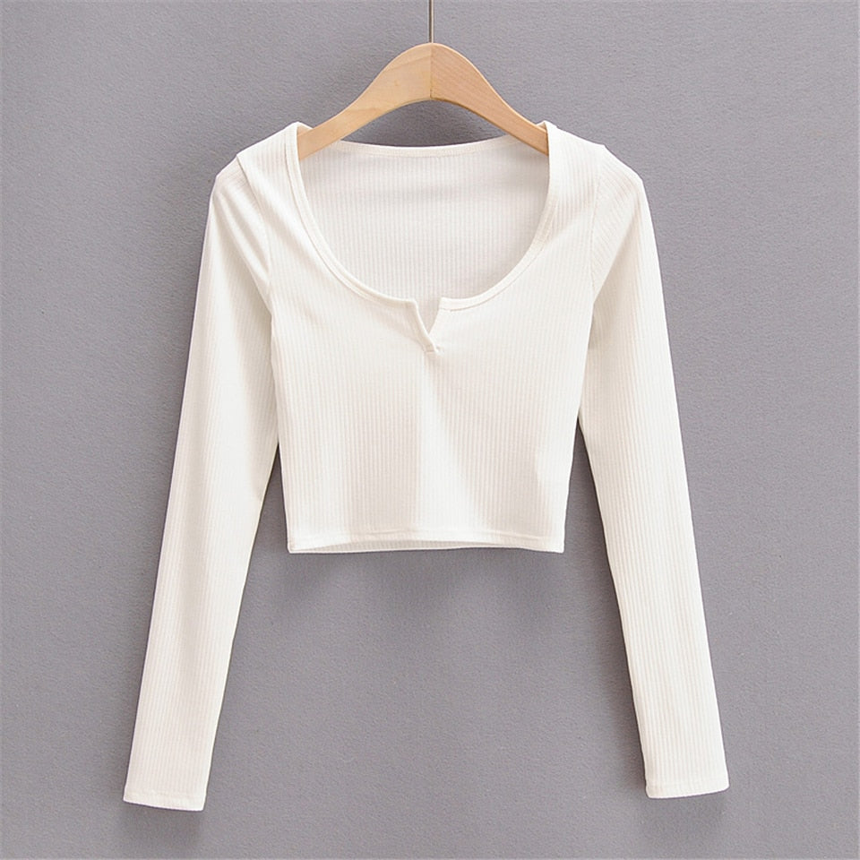 White V-neck long sleeve knitted crop top from The Clothing Company Sydney, slim fit with ribbed texture and casual style.