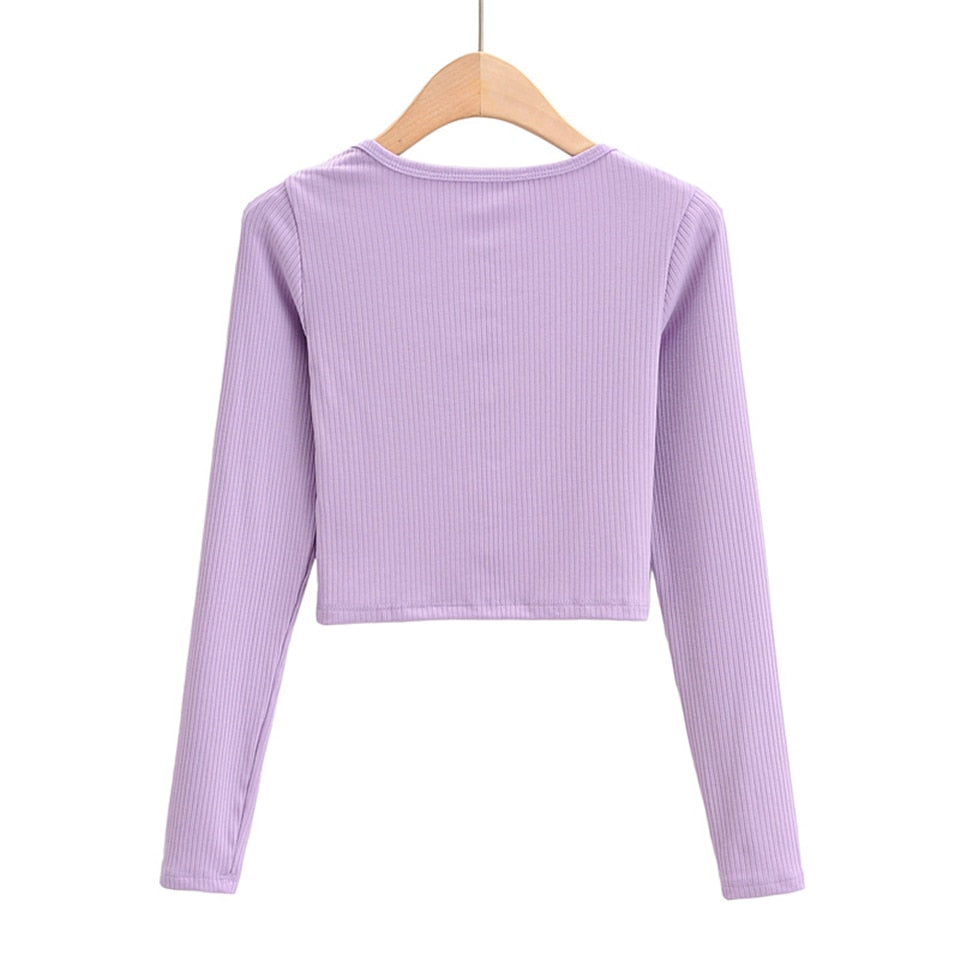 White V-neck long sleeve knitted crop top from The Clothing Company Sydney, slim fit with ribbed texture.