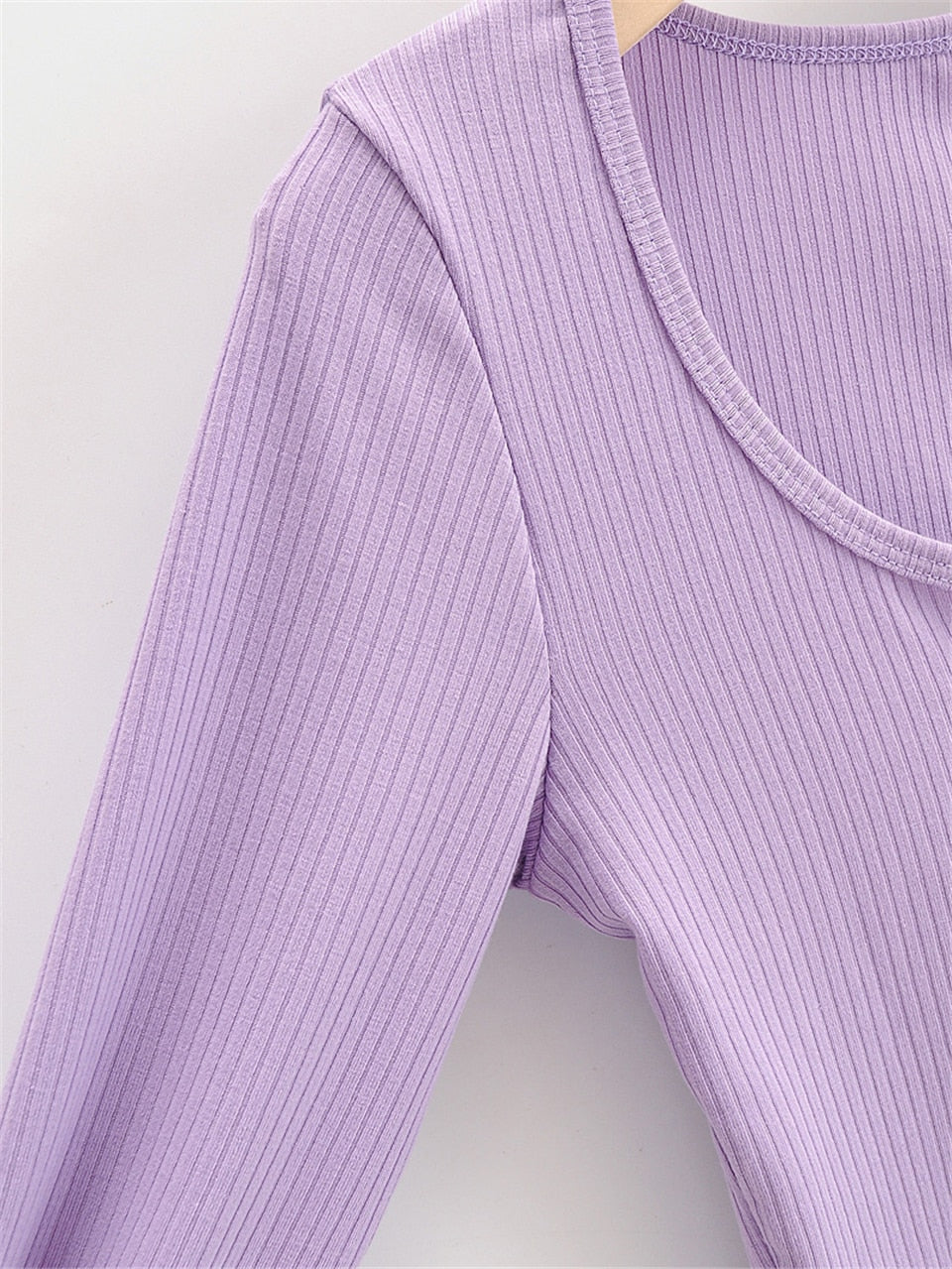 White V-neck long sleeve knitted crop top from The Clothing Company Sydney, slim fit with ribbed texture and casual style.