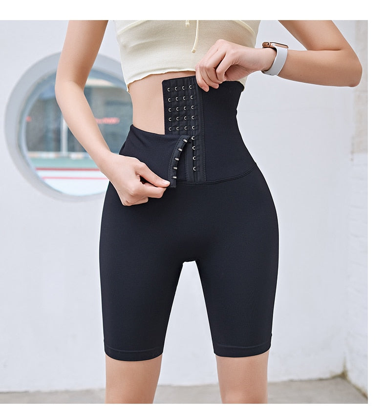 Seamless high-waist pink postpartum yoga leggings with fitness corset design, ideal for gym, running, and workout training.
