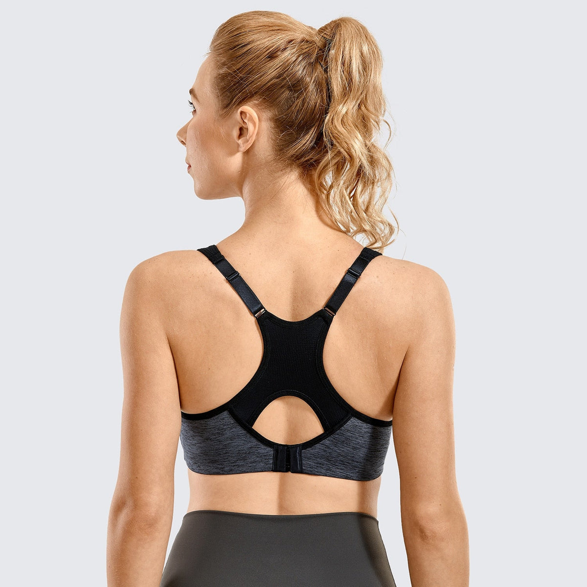 Women's moisture-wicking high-impact sports bra by The Clothing Company Sydney with padded, underwire, racerback design and full support.