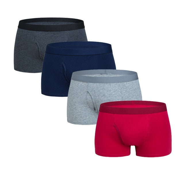 Four men's cotton boxer shorts in a pack, featuring trunks and briefs style from The Clothing Company Sydney.