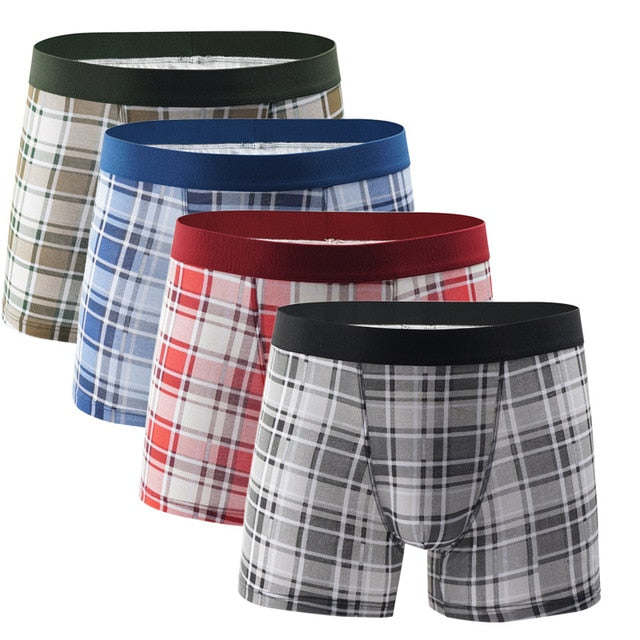 Four men's cotton boxer briefs in a pack from The Clothing Company Sydney, showcasing comfortable trunks and boxers.