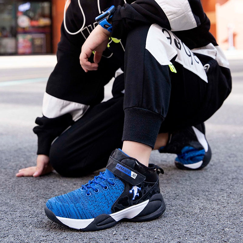 Kids basketball shoes from The Clothing Company Sydney, high-quality breathable sneakers for boys and girls with non-slip soles.