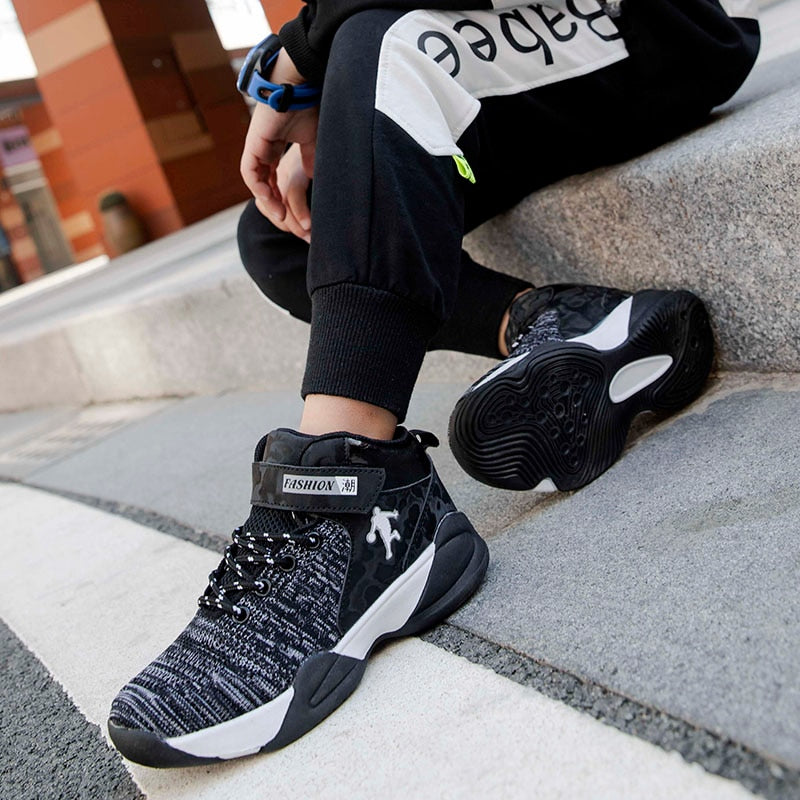 Kids basketball shoes by The Clothing Company Sydney, breathable, non-slip sport sneakers for boys and girls with high-quality design.