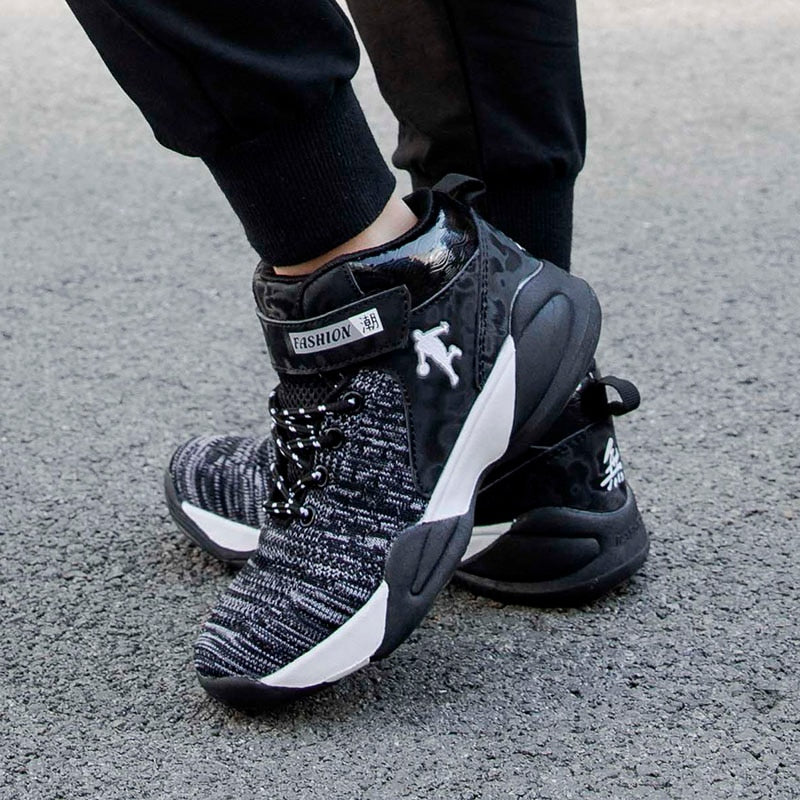 Kids' basketball shoes by The Clothing Company Sydney, breathable, non-slip sport sneakers for boys and girls with high-quality design.