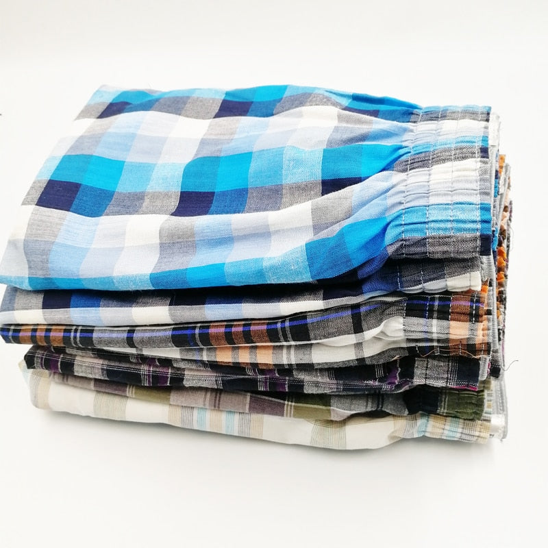 Four pairs of men's breathable cotton summer underwear shorts with plaid pattern and flexible fit by The Clothing Company Sydney.