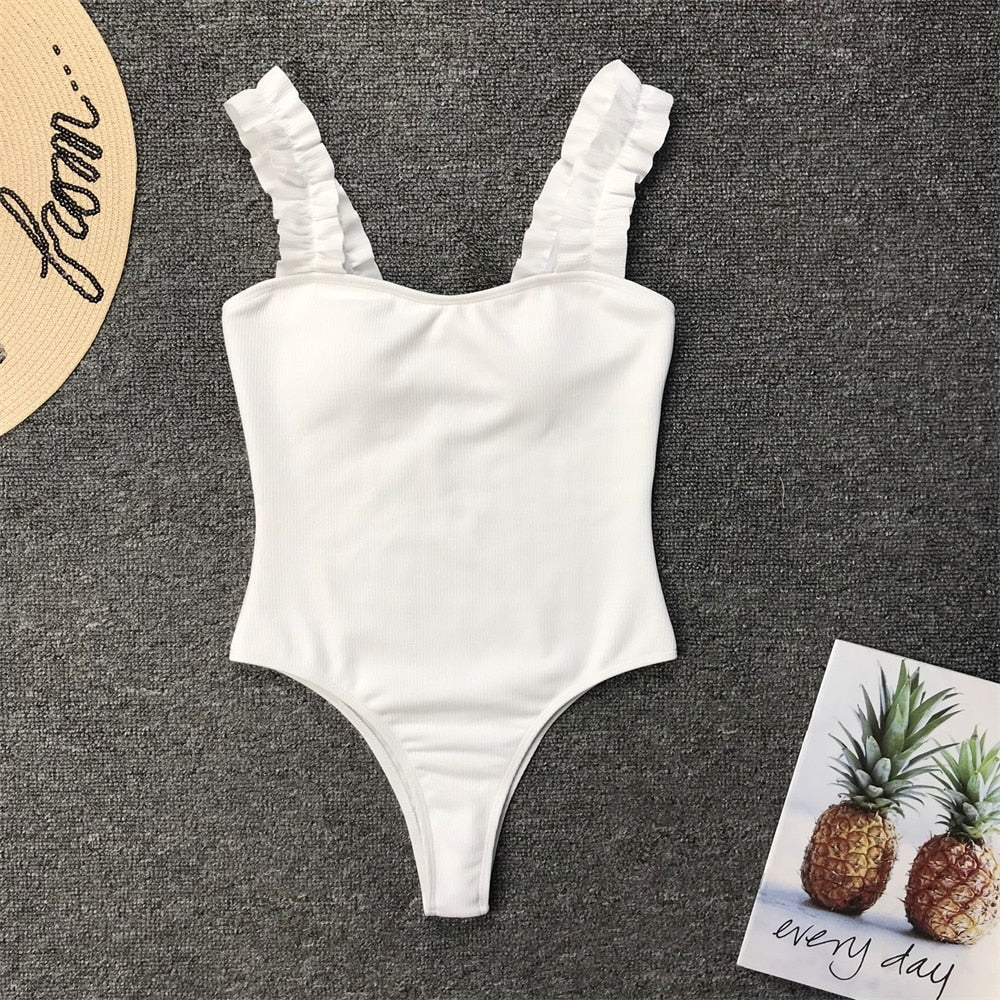 Vintage one-piece ruffled push-up solid swimwear by The Clothing Company Sydney featuring padded monokini bathing suit for women.