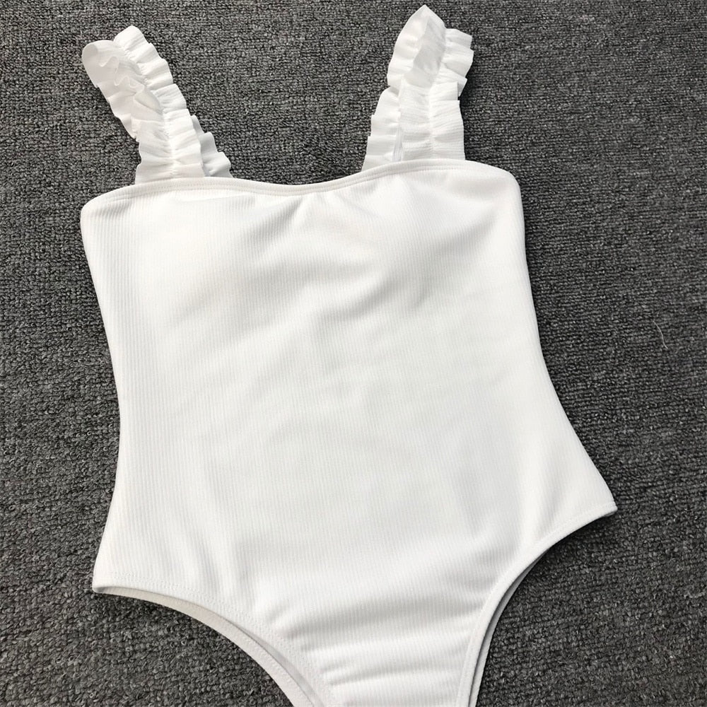 Vintage one-piece ruffled push-up solid swimsuit by The Clothing Company Sydney, featuring padded bust and stylish monokini design.