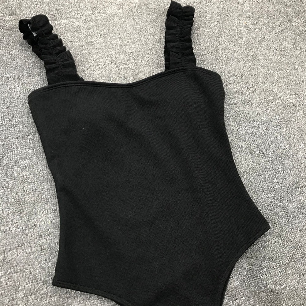 Vintage one-piece ruffled swimsuit by The Clothing Company Sydney featuring padded bust, solid color, and stylish monokini design.