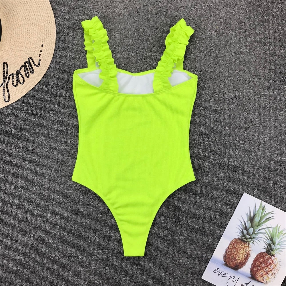 Vintage one-piece ruffled push-up monokini swimsuit with solid color, padded bra, from The Clothing Company Sydney.
