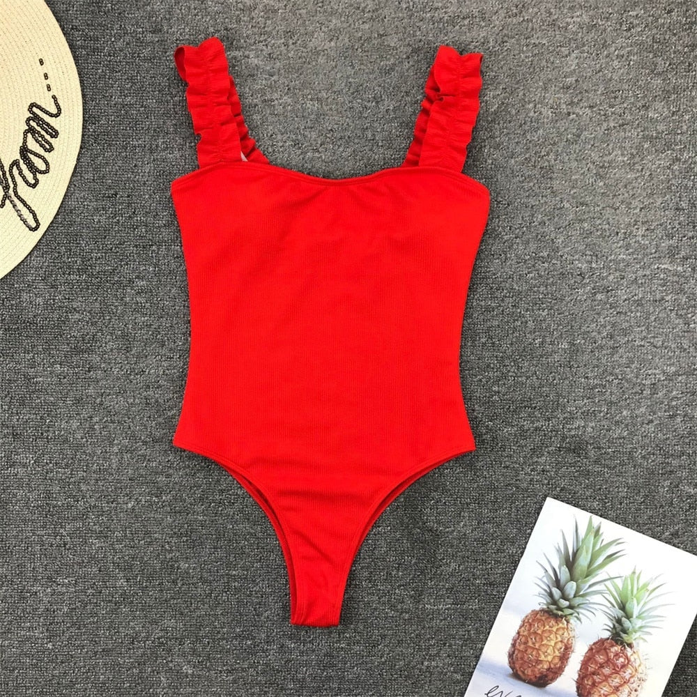 Vintage one-piece ruffled push-up solid swimwear monokini with padded cups, designed by The Clothing Company Sydney.