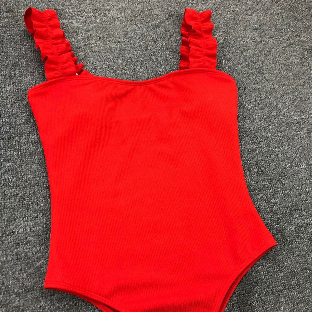 Vintage one-piece ruffled push-up solid swimsuit by The Clothing Company Sydney, featuring padded bust and classic monokini style.