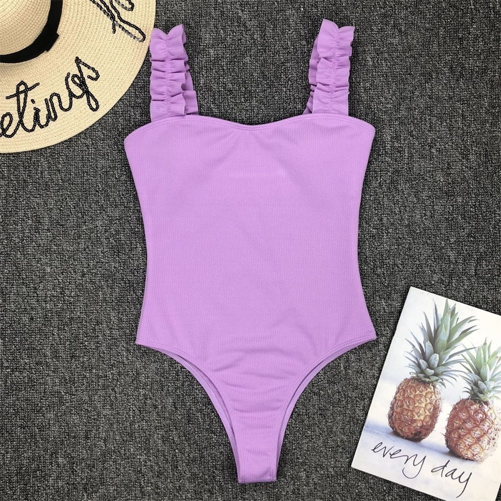 Vintage one-piece ruffled push-up solid swimwear by The Clothing Company Sydney, featuring padded monokini design and stylish swim suit.