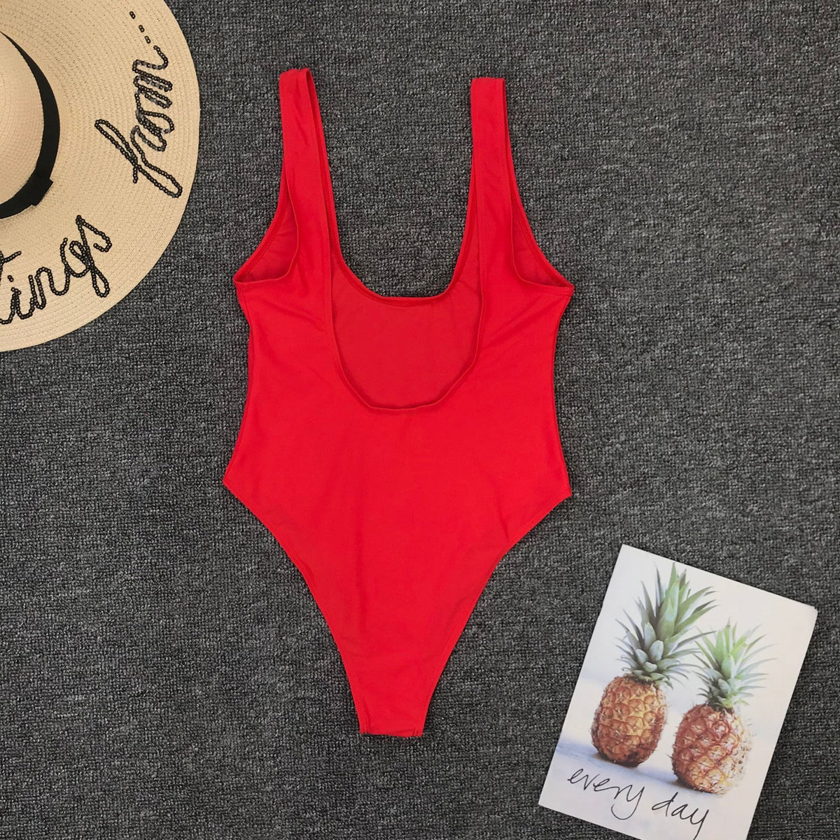 Vintage one-piece ruffled swimwear by The Clothing Company Sydney featuring padded monokini design and solid color.