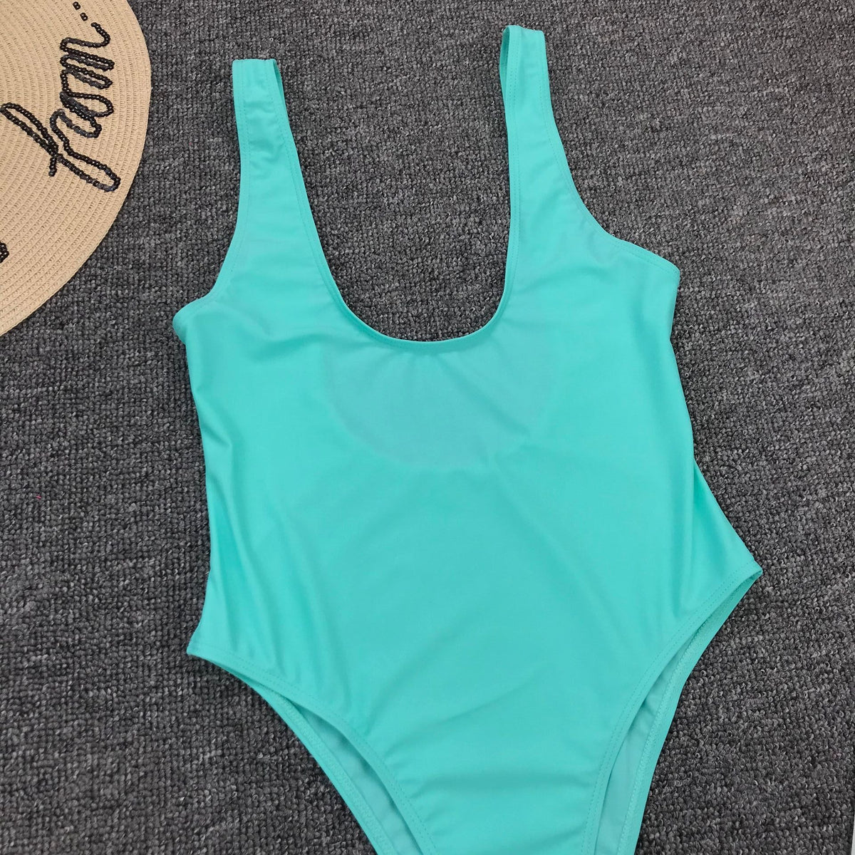 Vintage one-piece ruffled push-up solid swimwear by The Clothing Company Sydney featuring a padded monokini swimsuit with stylish ruffles.